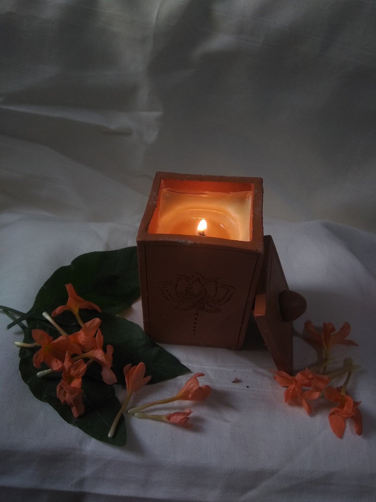 Shaktipadam Handmade Terracotta Aroma Candle: A Beacon of Tranquility and Spiritual Enlightenment