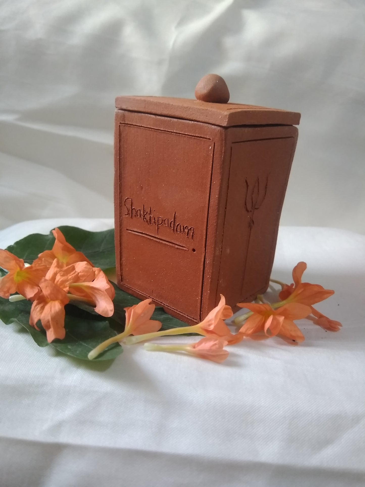 Shaktipadam Handmade Terracotta Aroma Candle: A Beacon of Tranquility and Spiritual Enlightenment