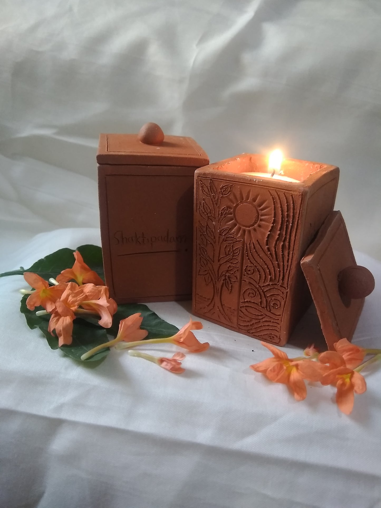 Shaktipadam Handmade Terracotta Aroma Candle: A Beacon of Tranquility and Spiritual Enlightenment