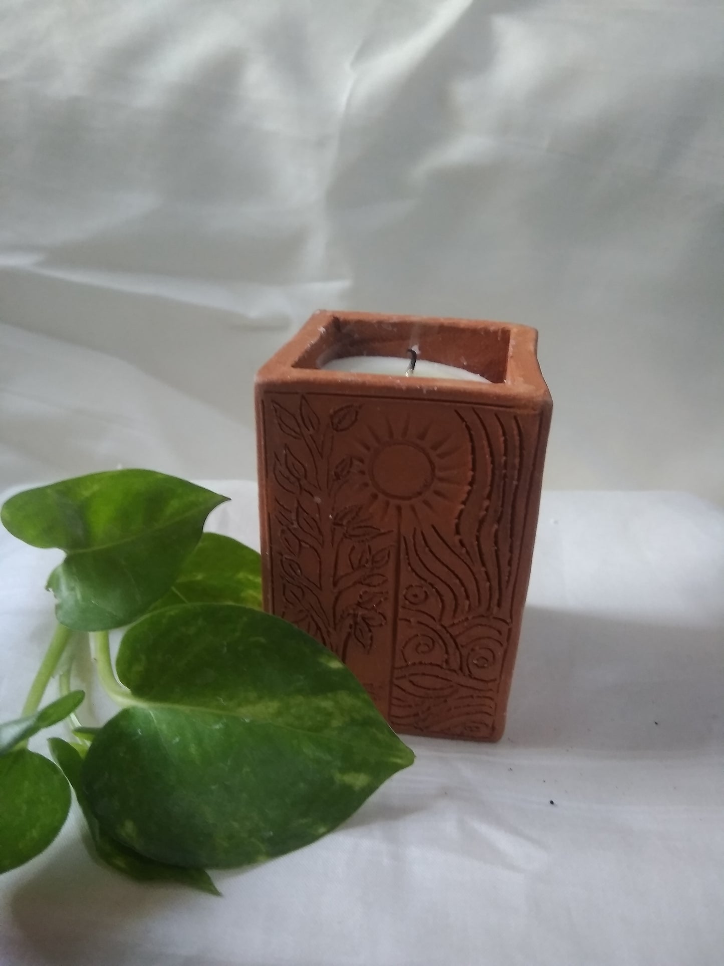 Shaktipadam Handmade Terracotta Aroma Candle: A Beacon of Tranquility and Spiritual Enlightenment